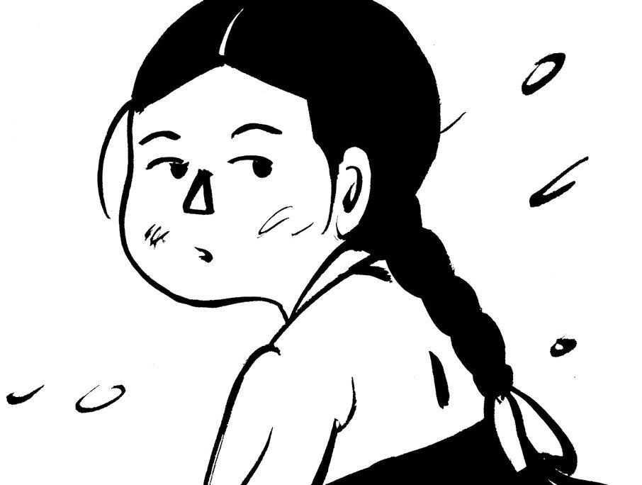 A girl with a long black braid looks over her shoulder.